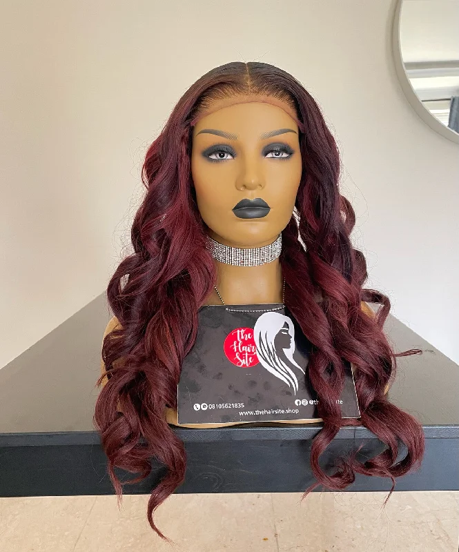 Lace wig with a wavy texture for a beachy lookZURI 6 X 6 BURGUNDY GLUELESS WIG