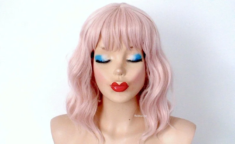 Colored wig with a pre - plucked hairline for a more natural look16" Antique Pink Short Wavy hair with Bangs Wig