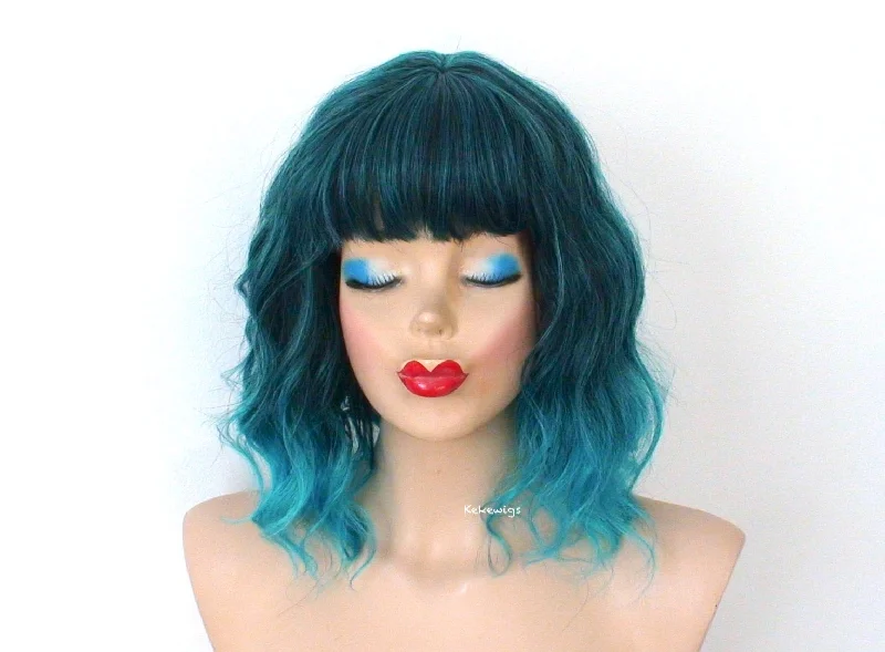 Colored wig in a vibrant pink color for a bold and eye - catching look16" Teal Blue Ombre Short Wavy Hair with Bangs Wig