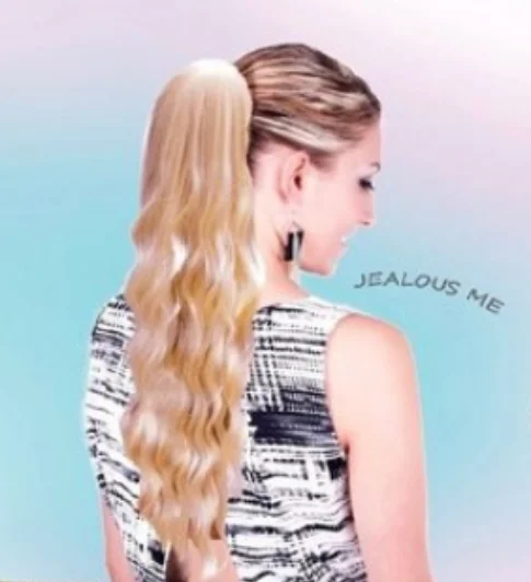 Ponytails with a side - swept bang for a flattering and stylish lookDESIGNER HAIR - JEALOUS ME PONYTAIL HAIR