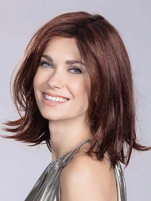 Medium - length wig with a curly texture for a bold and stylish choiceMelody | Heat Friendly Synthetic Lace Front (Mono Top) Wig by Ellen Wille