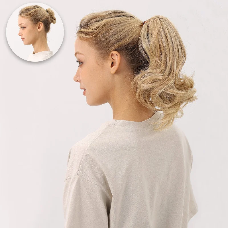 Curly ponytails with tight ringlets for a playful and feminine vibeJuvaBun Claw Clip Ponytail Extension 10''