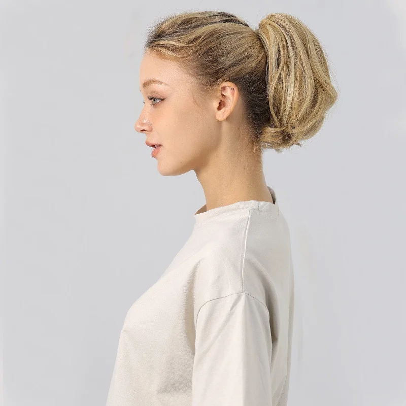 Ponytails with a middle - part for a classic and elegant styleJuvaBun Claw Clip Ponytail Extension 7'' UPGRADE